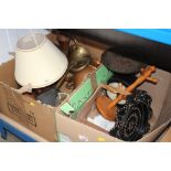 Two boxes containing various brassware, car horn,