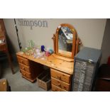 A pine dressing table and mirror