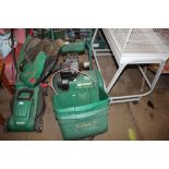 A Qualcast petrol cylinder lawnmower