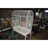 A parrot cage on wheels