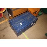 A blue painted metal trunk