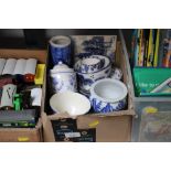 A box of various blue and white china