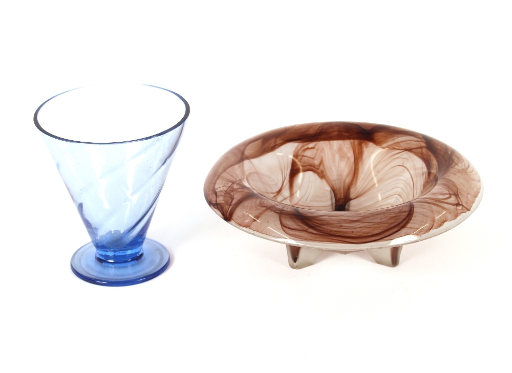 An Art Deco mottled glass bowl, raised on three st