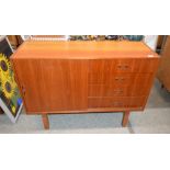 A teak G plan design sideboard, fitted four long d