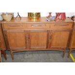 A teak G plan design sideboard, fitted three drawe