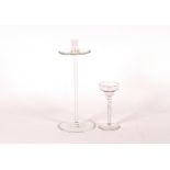 A clear glass candle stand, 30cm high; and a small