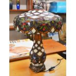 An Art Deco style Tiffany type table lamp with fol