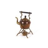 A copper and brass tea kettle, on spirit heater st