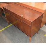 A teak sideboard, fitted two blind frieze drawers