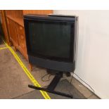 A Bang & Olufsen television, on swivel stand compl
