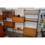 Three sections of teak Ladderax units including dis