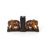 A pair of composition decorative elephant book-end