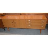 A teak effect sideboard, fitted double cupboard an