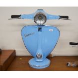 A novelty lamp in the form of a Vespa motor scoote