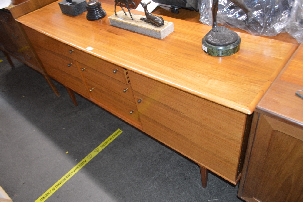 A hand craft walnut sideboard, fitted three centra