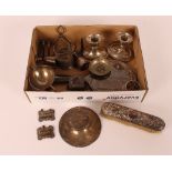 A collection of various silver items including a c