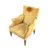 A Howard & Sons type armchair, stamped Howard & Sons London to one brass castor and stamped WB 9118