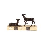 An Art Deco marble and spelter deer group