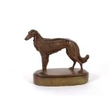 A bronze figure of a setter, 20cm long