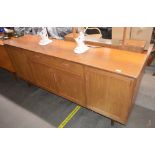 A teak G plan design sideboard, fitted central dra