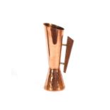 An Art Deco design copper vase with teak handle