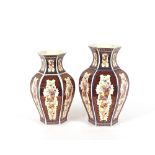 A pair of Oriental octagonal baluster vases, 37cm