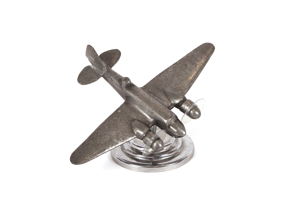 A Model of a Blenheim bomber, on circular chrome p