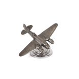 A Model of a Blenheim bomber, on circular chrome p