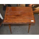 An Edwardian Mahogany card table, with label for Howard & Sons, London