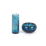 A blue swirled Art Glass bowl, 12cm dia. and a mat