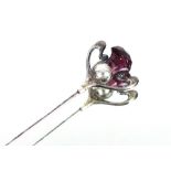 A silver and amethyst set hat pin by Pierce & Thom