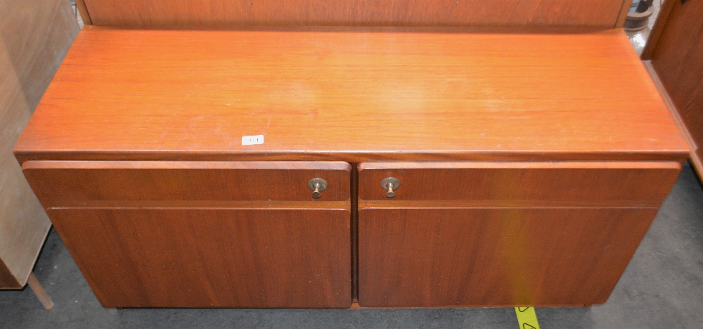 A teak G plan design low cabinet, enclosed by a pa
