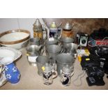 A quantity of pewter tankards, steins etc.