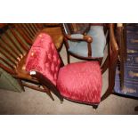 A Victorian mahogany and red velvet upholstered bu