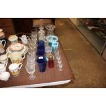 A collection of various glassware to include decan