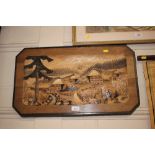 A Bavarian carved wooden panel depicting a landsca