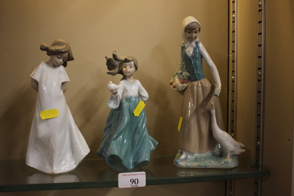 Three various Nao figurines