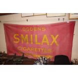 An Ogdens Smilax cigarette shop hanging sign