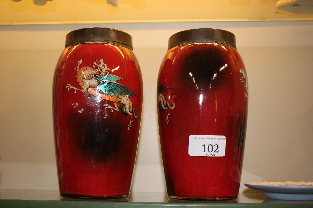 A pair of Stourbridge ware tobacco jars and covers