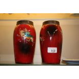 A pair of Stourbridge ware tobacco jars and covers
