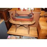 A small mahogany footstool; on oak oblong coffee t