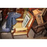 A late Victorian walnut button back upholstered ar