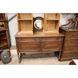 A 1920's / 30's oak sideboard fitted two drawers a