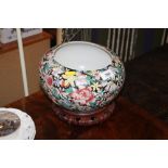 A modern Chinese floral decorated jardiniere on st