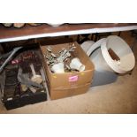 Three boxes containing light fittings and shades;