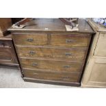 An early 20th Century oak chest fitted two short o