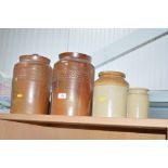 Four stoneware jars