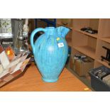 A turquoise jug