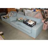 A Next teal upholstered three seater settee, with