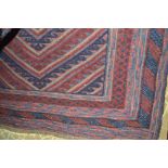An approx 4' x 3'9" Gazak rug